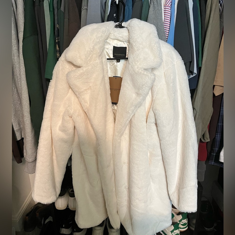 Weatherproof white fur coat